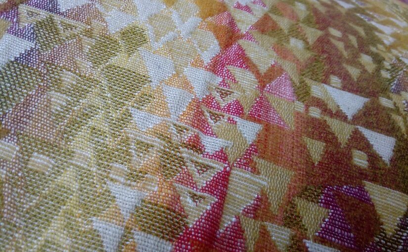 Coloured fabric with triangle patterns